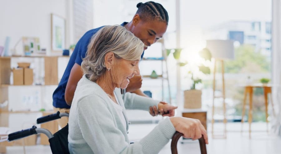 A caregiver speaking with a senior client